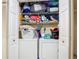 A well-organized closet features shelves, hanging space, washer and dryer for storage and laundry convenience at 1748 Foxhall Cir # 1748, Kissimmee, FL 34741