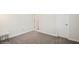 Cozy bedroom space with gray carpet and access to two doors at 1835 Southern Red Oak Ct, Ocoee, FL 34761