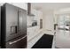 Well-equipped kitchen with stainless steel appliances and ample counter space at 1835 Southern Red Oak Ct, Ocoee, FL 34761