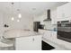 Modern kitchen featuring a large island, stainless steel appliances, and white cabinetry at 1835 Southern Red Oak Ct, Ocoee, FL 34761