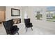Sitting area with marble floors, comfortable seating, a decorative table, and windows providing natural light at 1835 Southern Red Oak Ct, Ocoee, FL 34761
