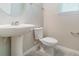 Bathroom featuring a pedestal sink, tile flooring and a window at 1997 Standing Rock Cir, Oakland, FL 34787