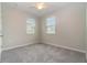 Bright bedroom with neutral walls, carpet flooring and a ceiling fan at 1997 Standing Rock Cir, Oakland, FL 34787