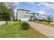 Exterior of house featuring a brick driveway, and landscaping at 1997 Standing Rock Cir, Oakland, FL 34787