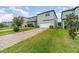 View of home with brick paver driveway and well manicured lawn at 1997 Standing Rock Cir, Oakland, FL 34787