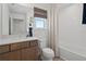 Clean bathroom with tiled shower/tub, modern vanity, and window for natural light adds comfort and style at 2054 Education St, St Cloud, FL 34771