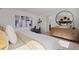 Bright and spacious bedroom featuring elegant decor and tranquil views from the windows at 2054 Education St, St Cloud, FL 34771