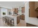 Well-lit kitchen with a large center island, stainless appliances, and modern cabinetry with ample counter space at 2054 Education St, St Cloud, FL 34771