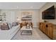 Bright living area with modern decor, stylish seating, and an open layout at 2054 Education St, St Cloud, FL 34771