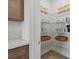 Walk-in pantry providing ample shelving and storage for food and kitchen essentials at 2054 Education St, St Cloud, FL 34771