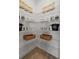 Spacious walk-in pantry featuring wire shelving for organized storage of food and household items at 2054 Education St, St Cloud, FL 34771