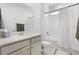 Well-lit bathroom featuring a shower-tub combination and a vanity with a countertop at 2223 Blue Salvia St, Clermont, FL 34711