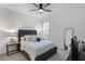 Comfortable bedroom with plush bedding, side tables with lamps, and a full-length mirror at 2223 Blue Salvia St, Clermont, FL 34711