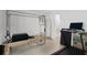 Home bonus room featuring a pilates machine and a treadmill with natural light at 2223 Blue Salvia St, Clermont, FL 34711