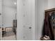 Open mud room features a utility sink, coat rack and access to laundry room at 2223 Blue Salvia St, Clermont, FL 34711
