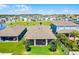 Birds eye view of screened patio and fenced backyard at 2223 Blue Salvia St, Clermont, FL 34711