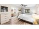Well-lit bedroom boasts a ceiling fan and light gray walls at 244 Angeles Rd, Debary, FL 32713
