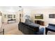 Bright living room featuring modern decor, comfortable seating, a workspace, and lots of natural light at 244 Angeles Rd, Debary, FL 32713