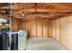 Unfinished shed with exposed wood framing and storage tanks at 244 Angeles Rd, Debary, FL 32713