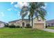 Charming home with beautiful green lawn and inviting curb appeal in a sunny location at 244 Ballyshannon Dr, Davenport, FL 33897