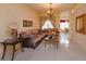 Comfortable living room with tile flooring, neutral color palette, and lots of natural light at 244 Ballyshannon Dr, Davenport, FL 33897