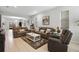 Spacious living room featuring comfortable seating, neutral decor, and plenty of natural light at 2514 Citrus Club Ln # 308, Orlando, FL 32839