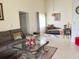 Inviting living room with stylish furniture, decorative rugs, and plenty of natural light at 2514 Citrus Club Ln # 308, Orlando, FL 32839