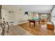 Spacious game room features hardwood floors and ample natural light, perfect for entertaining at 2524 Sweetwater Trl, Winter Park, FL 32789