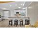 Open-concept kitchen with a large island, modern appliances, and comfortable seating at 2524 Sweetwater Trl, Winter Park, FL 32789