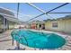 Backyard pool featuring turquoise water, patio, and screened enclosure at 2524 Sweetwater Trl, Winter Park, FL 32789