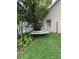Backyard features a hammock, mature trees, and nice landscaping for relaxing outdoors at 300 Churchill Dr, Longwood, FL 32779