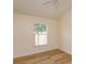 Bright bedroom with hardwood floors and a window providing natural light at 300 Churchill Dr, Longwood, FL 32779