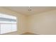 Well-lit bedroom featuring a ceiling fan and a window with blinds at 300 Churchill Dr, Longwood, FL 32779
