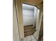 Walk-in closet featuring wood-look floors and metal shelving at 300 Churchill Dr, Longwood, FL 32779