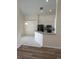 Open kitchen features granite countertops and stainless steel appliances at 300 Churchill Dr, Longwood, FL 32779