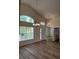 Bright living room with wood floors, vaulted ceilings and lots of natural light at 300 Churchill Dr, Longwood, FL 32779
