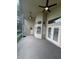 Spacious patio with ceiling fans, and screened in porch area perfect for enjoying the outdoors at 300 Churchill Dr, Longwood, FL 32779