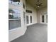 Open patio with double doors and large windows providing natural light at 300 Churchill Dr, Longwood, FL 32779