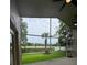 Screened patio overlooking lush backyard, ideal for outdoor entertaining at 300 Churchill Dr, Longwood, FL 32779