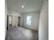 Comfortable bedroom featuring soft carpet, neutral walls, and a closet at 3087 Sunset Hills Rd, Winter Haven, FL 33881