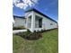 Stylish single-story home featuring a covered front porch and tasteful landscaping at 3087 Sunset Hills Rd, Winter Haven, FL 33881