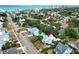 Charming coastal home with a light blue exterior and lush landscaping, conveniently located near the beach and city amenities at 330 Phoenix Ave, Daytona Beach, FL 32118