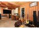 Spacious living room featuring paneled walls and ample space for furniture at 330 Phoenix Ave, Daytona Beach, FL 32118