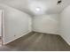 A bedroom featuring neutral carpet, white walls, and ample natural light at 3321 Crimson Ln, Deltona, FL 32738