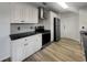 Modern kitchen with stainless steel appliances, granite countertops, and ample storage space at 3321 Crimson Ln, Deltona, FL 32738