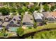 Overhead shot of the back of the house highlighting the screened in pool and adjacent waterway at 334 N Shadowbay Blvd, Longwood, FL 32779