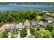 A beautiful home with mature trees on the property with a lake view from the backyard at 334 N Shadowbay Blvd, Longwood, FL 32779