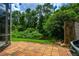 Brick paver patio with a view of lush, private landscaping at 334 N Shadowbay Blvd, Longwood, FL 32779