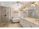 Luxurious bathroom featuring a separate glass shower, clawfoot tub, and dual vanity sinks at 334 N Shadowbay Blvd, Longwood, FL 32779