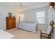 Comfortable bedroom with neutral walls and a cozy bed, providing a relaxing atmosphere at 334 N Shadowbay Blvd, Longwood, FL 32779